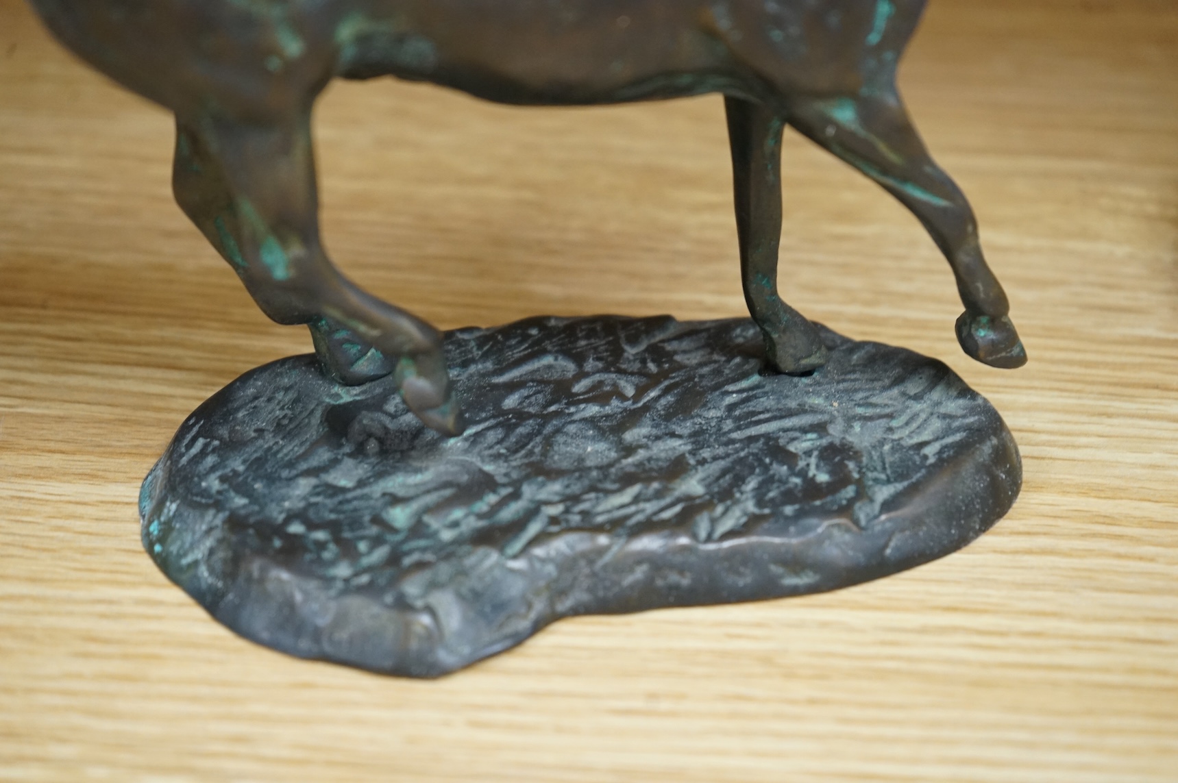 A bronze model of a horse, 23cm wide